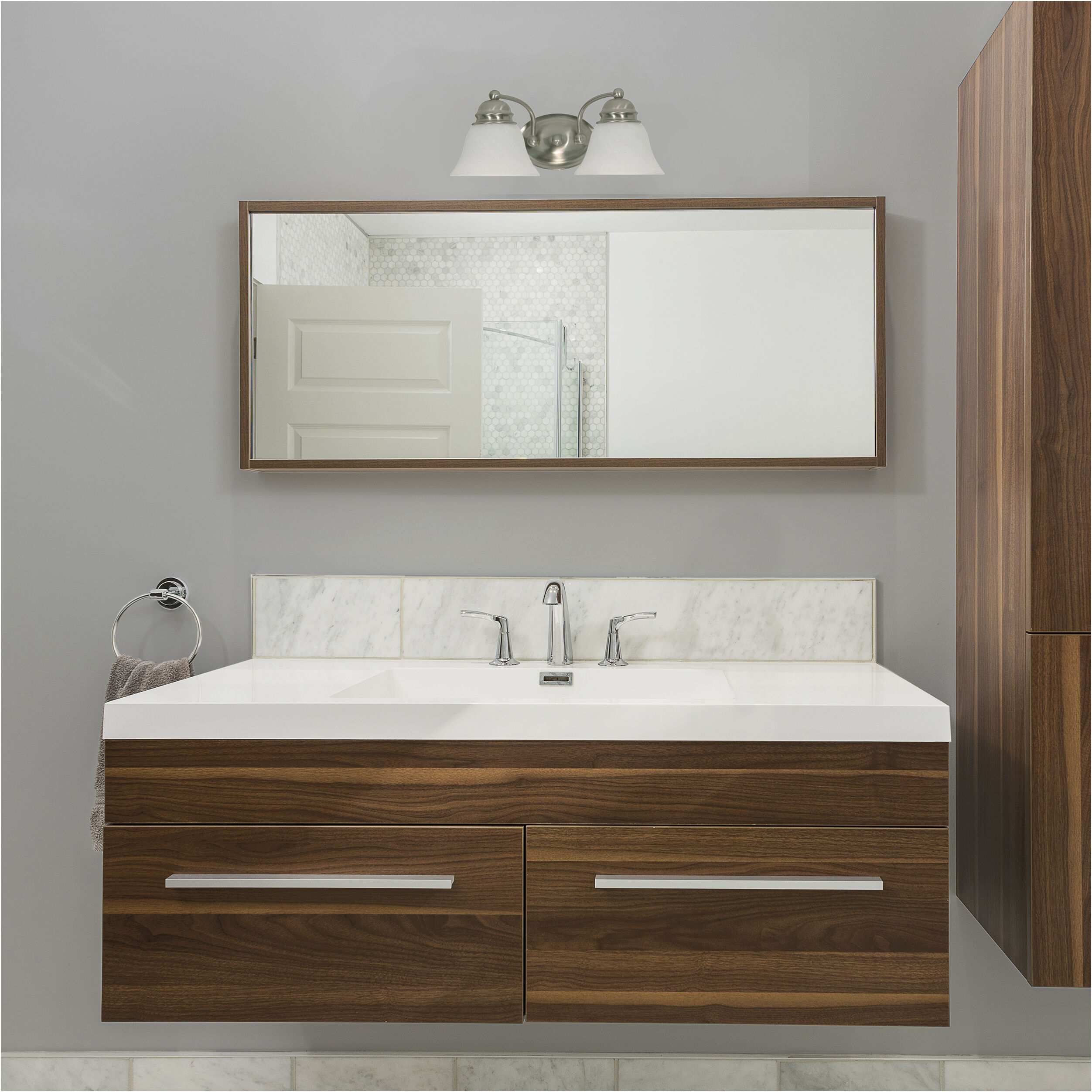 Wood and brushed nickel vanity light outlet